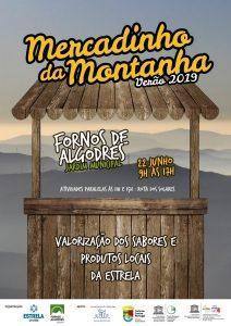 Cartaz de evento com balcão de madeira e montanhas ao fundo, anunciando Mercadinho da Montanha Verão 2019